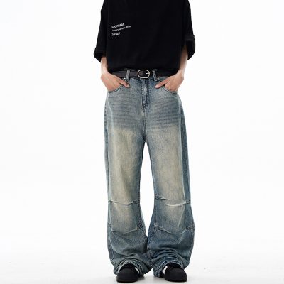 Model wearing loose wide-leg denim pants in an American retro style